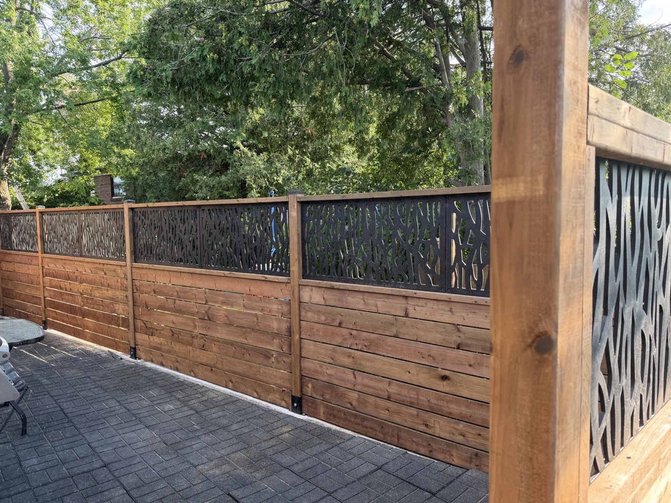 Decorative wood and metal fence alternate view by Manulock Construction