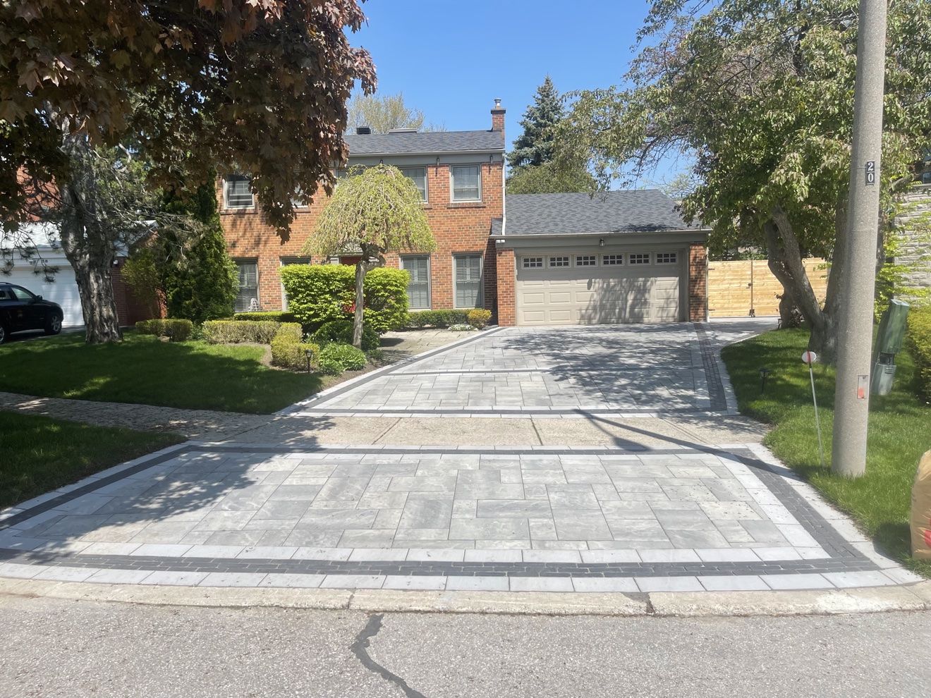 Interlocking paver driveway installed by Manulock Construction